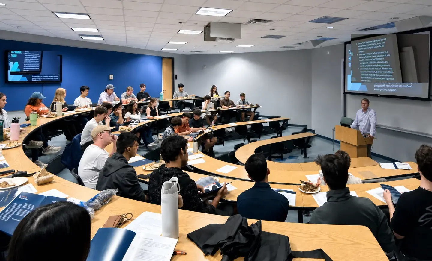 WMSO members attending a case study in a lecture hall.